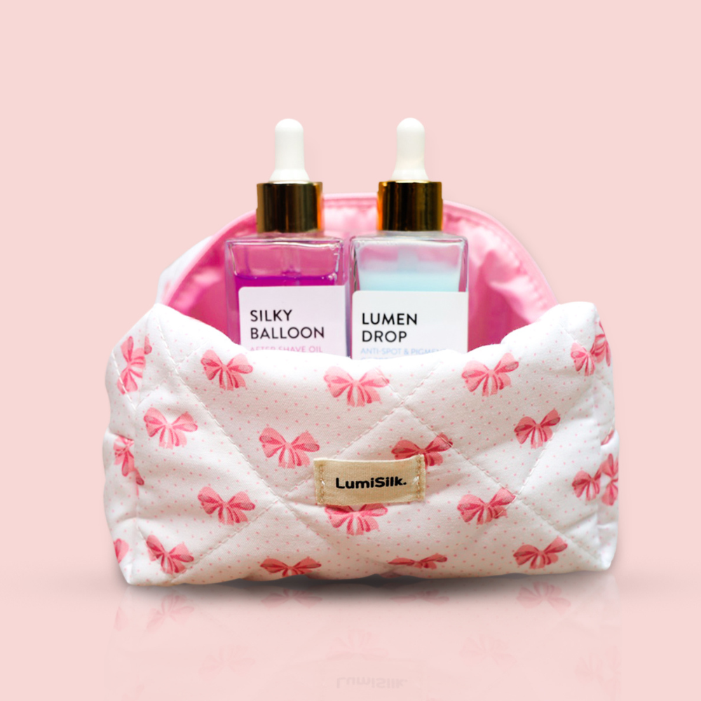 Dúo LumiSilk con aceite pre-afeitado Silky Balloon y sérum antipigmentación Lumen Drop en bolsita rosa con lazos